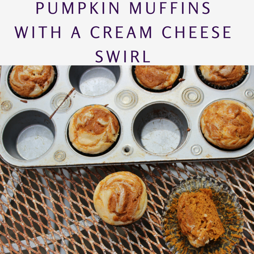 pumpkin muffins with a cream cheese swirl
